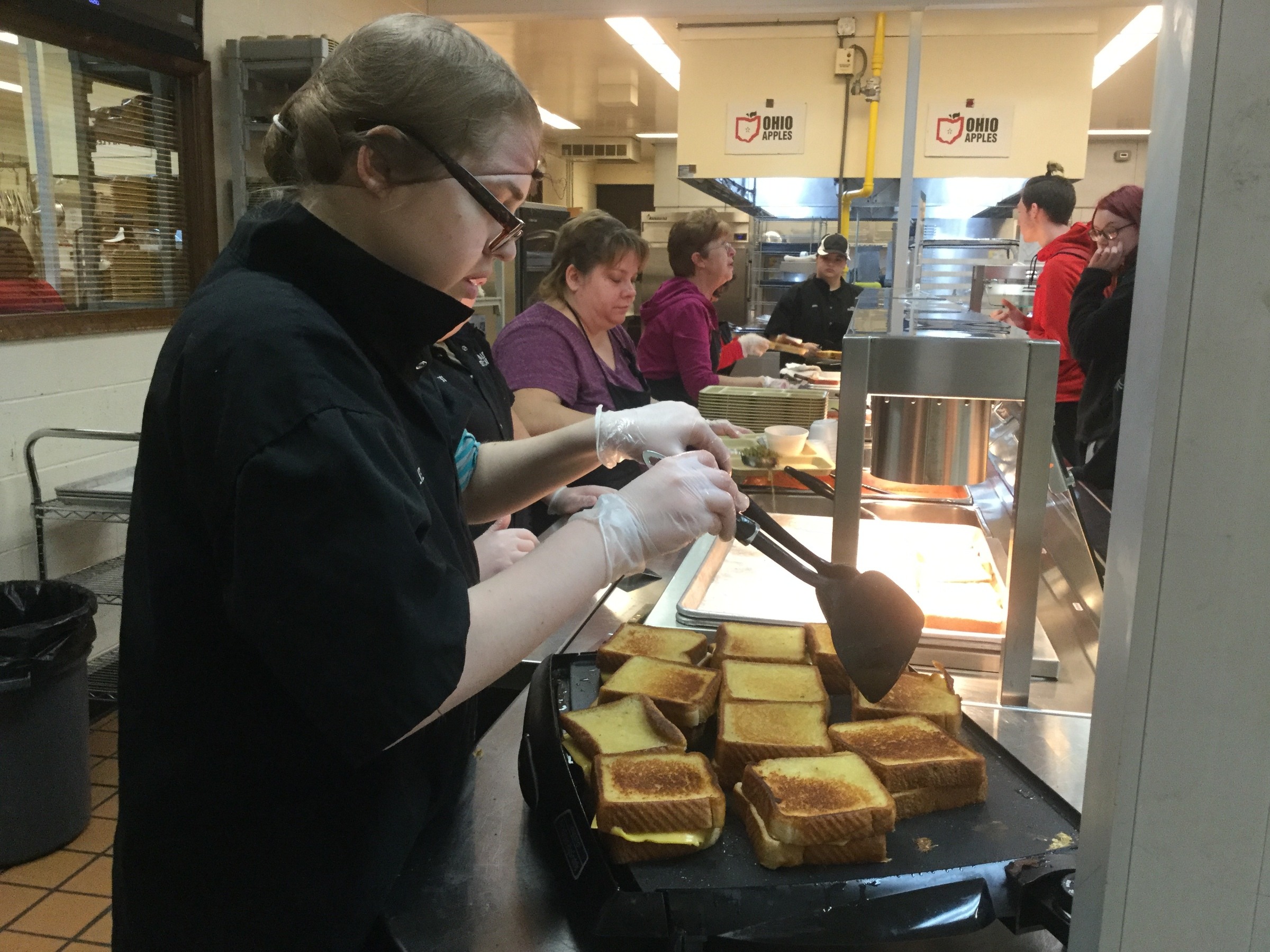 Students and cafe workers Serving in Cafeteria