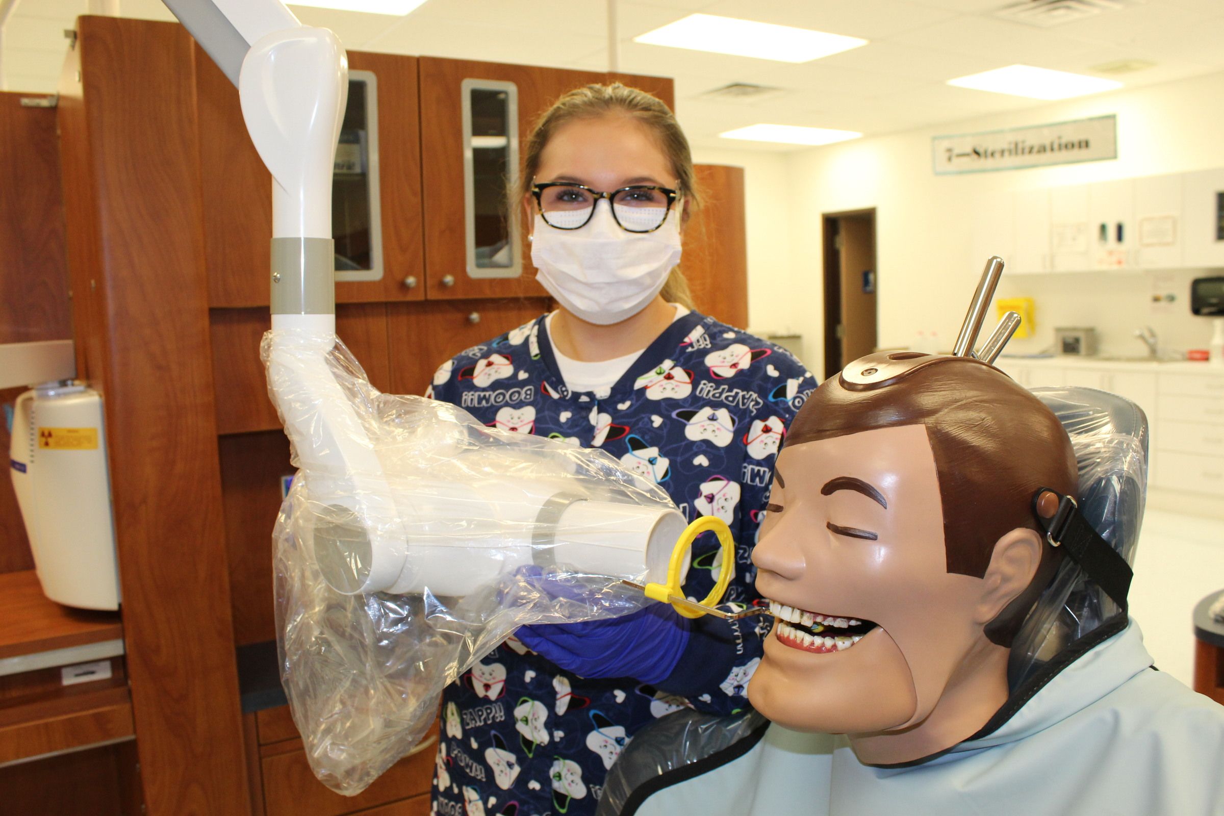 Dental Assisting student taking an x-ray