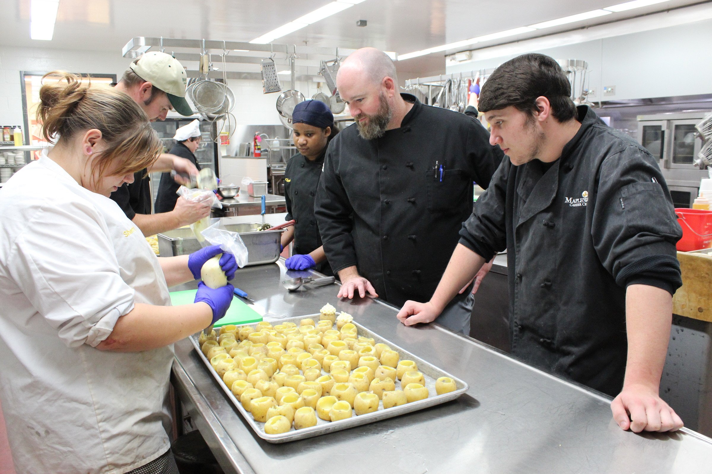 Chef Buckles in lab with students
