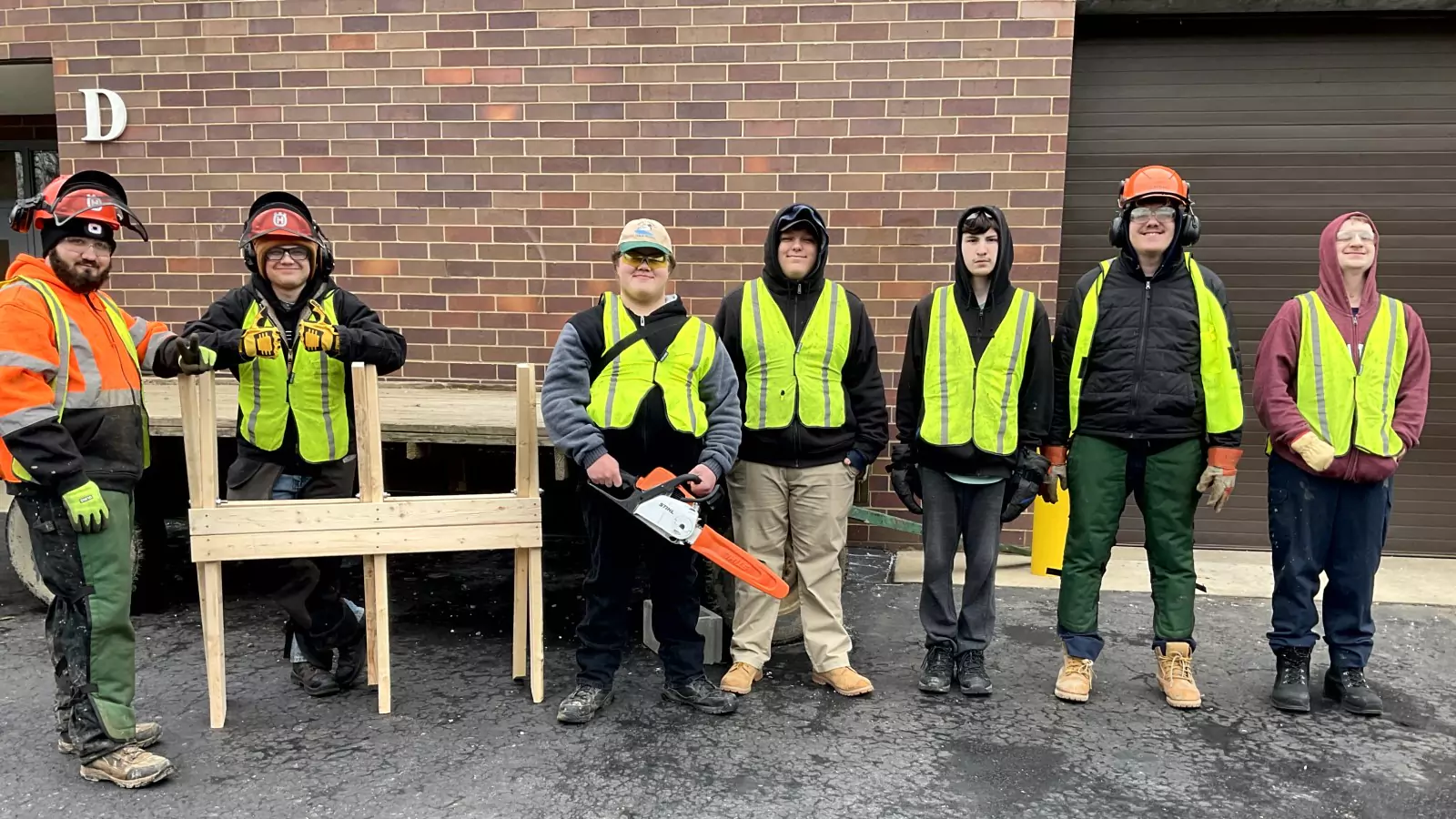 mechanical groundskeeping students posing for a photo