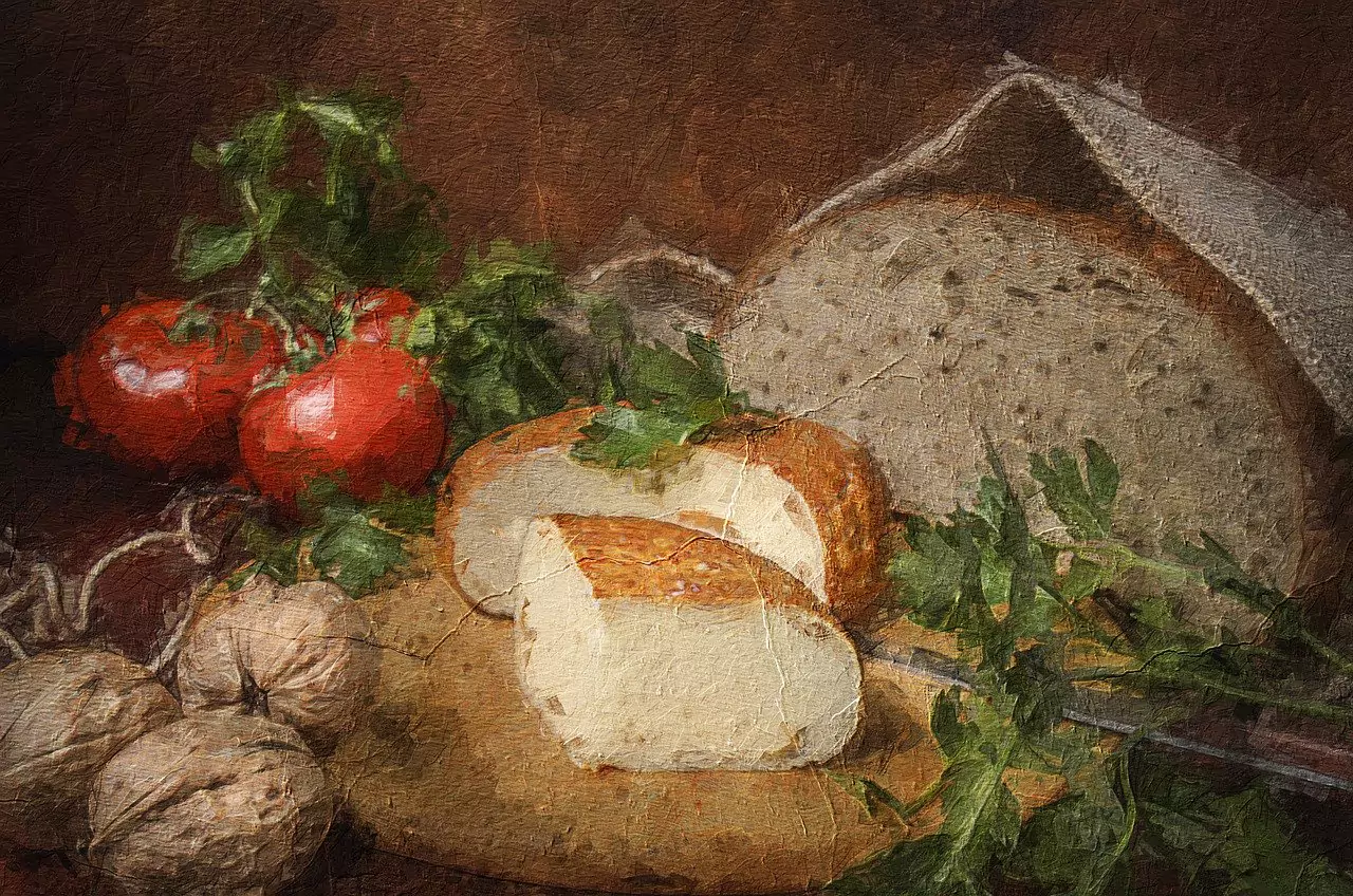a painting of bread and tomatoes